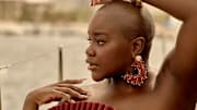 Achieng Agutu was photographed by Yu Tsai in Mexico. Swimsuit by Andrea Iyamah. Bracelets by Alexis Bittar. Earrings by JOHANNA ORTIZ VACATION. 