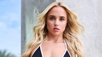 Hailey Van Lith was photographed by Taylor Ballantyne/Sony Alpha in Fort Worth, Texas. Swimsuit by LSPAC. Jeans by Dries Van Noten. 