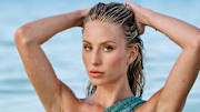 Alix Earle was photographed by Yu Tsai in Florida. Swimsuit by Oséree.