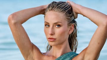 Alix Earle was photographed by Yu Tsai in Florida. Swimsuit by Oséree.