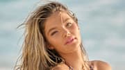 Ellie Thumann was photographed by Yu Tsai in Mexico. Swimsuit by Santa Brands. 
