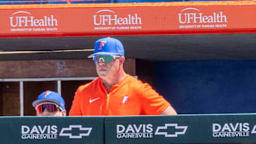 Florida baseball head coach Kevin O'Sullivan watches from the dugout during Game 1 of a doubleheader against Tennessee on May 3. The Gators need to win 3 of their final 6 games to ensure an NCAA Tournament berth this season
