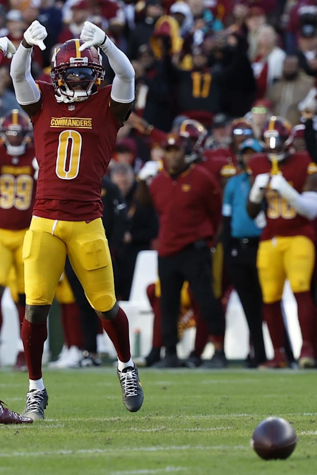 Washington Commanders cornerback Mike Sainristil celebrates after defending a pass attempt against the Dallas Cowboys