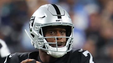 Sep 15, 2025; Paradise, Nevada, USA; Las Vegas Raiders quarterback Geno Smith (7) drops back to pass during the first quarter against the Los Angeles Chargers at Allegiant Stadium. Mandatory Credit: Kiyoshi Mio-Imagn Images