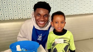 St. Joseph-Santa Mara senior Tounde Yessoufou, a McDonald's All-American and leading scorer in California history, poses with patient at the Hyde Park House via the Ronald McDonald House Charities New York Metro on March 29, 2025