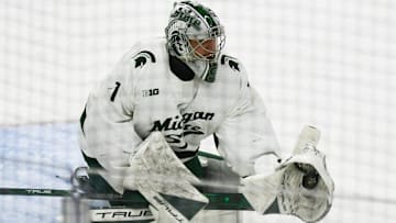 MSU's Trey Augustine works the net against Ohio State, Saturday, March 22, 2025, during the second period of the Big 10 Hockey final at Munn Ice Arena.