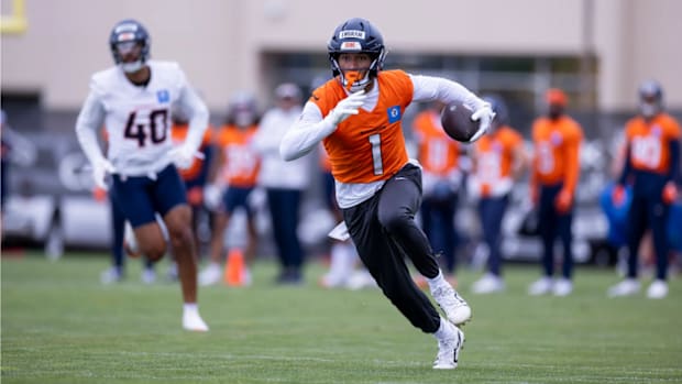 Denver Broncos tight end Evan Engram (1) runs a route during an OTA practice at Broncos Park Powered by CommonSpirit.
