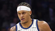 Orlando Magic forward Paolo Banchero controls the ball against the Portland Trail Blazers.