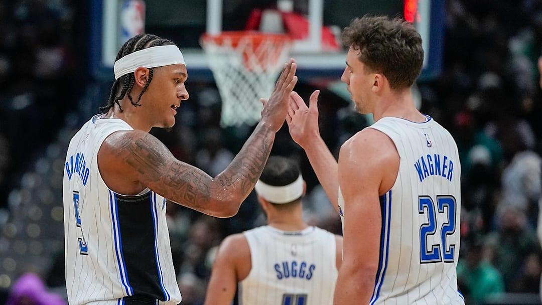 Paolo Banchero, Franz Wagner and Jalen Suggs of the Orlando Magic during an NBA game versus the Washington Wizards.
