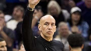 Apr 13, 2025; Sacramento, California, USA;  Sacramento Kings interim head coach Doug Christie gestures to the Phoenix Suns bench after the game at Golden 1 Center. Mandatory Credit: John Hefti-Imagn Images