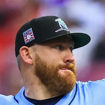 Tampa Bay Rays starting pitcher Zack Littell (52) pitches against the Cincinnati Reds in the first inning at Great American Ball Park on July 25. 