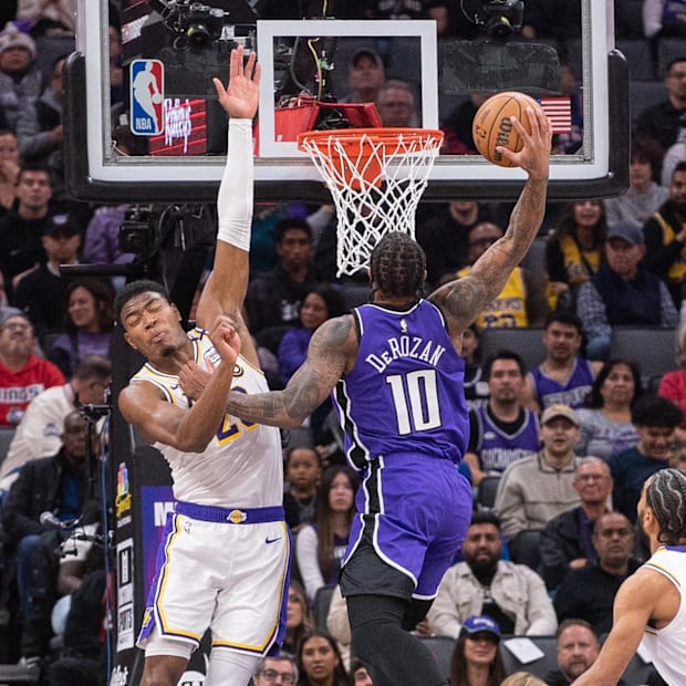 Sacramento Kings forward DeMar DeRozan (10) dunks the ball against Los Angeles Lakers forward Rui Hachimura (28)