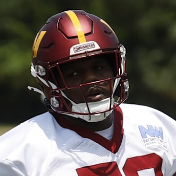 Jun 10, 2025; Ashburn, VA, USA; Washington Commanders offensive tackle Josh Conerly Jr. (72) jogs on the field during drills on day one of minicamp at Commanders Park. Mandatory Credit: Geoff Burke-Imagn Images
