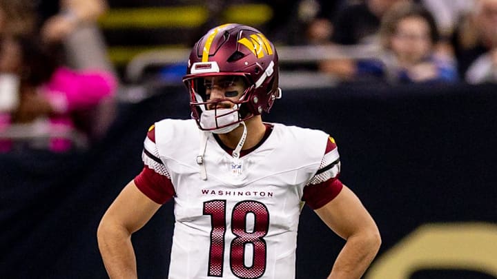  Washington Commanders quarterback Marcus Mariota (18) looks on against the New Orleans Saints during the first half at Caesars Superdome. Mandatory Credit: Stephen Lew-Imagn Images