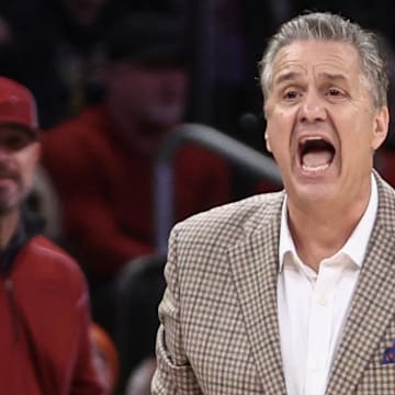 Arkansas Razorbacks head coach John Calipari yells out instructions in the second half against the Michigan Wolverines at Madison Square Garden. 