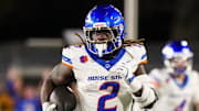 Nov 23, 2024; Laramie, Wyoming, USA; Boise State Broncos running back and Heisman Trophy candidate Ashton Jeanty (2) runs for a touchdown against the Wyoming Cowboys during the first quarter at Jonah Field at War Memorial Stadium. Mandatory Credit: Troy Babbitt-Imagn Images

