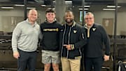 2026 4-Star RB Evan Hampton alongside Vanderbilt coaches Clark Lea, Ghaali Muhammad-Lankford and Tim Beck 
