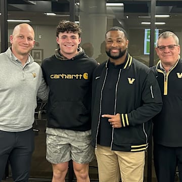 2026 4-Star RB Evan Hampton alongside Vanderbilt coaches Clark Lea, Ghaali Muhammad-Lankford and Tim Beck 