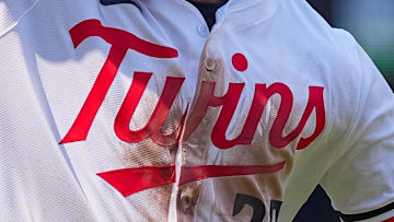 The Minnesota Twins logo on center fielder Byron Buxton's jersey during a July 2025 game