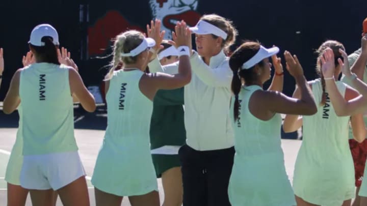 Miami Hurricanes Women's Tennis celebrating a victory 