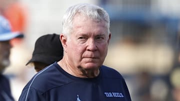 Oct 26, 2024; Charlottesville, Virginia, USA; North Carolina Tar Heels head coach Mack Brown walks off the field after the Tar Heels' game against the Virginia Cavaliers at Scott Stadium. Mandatory Credit: Geoff Burke-Imagn Images