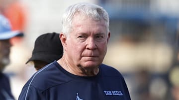 Oct 26, 2024; Charlottesville, Virginia, USA; North Carolina Tar Heels head coach Mack Brown walks off the field after the Tar Heels' game against the Virginia Cavaliers at Scott Stadium. Mandatory Credit: Geoff Burke-Imagn Images