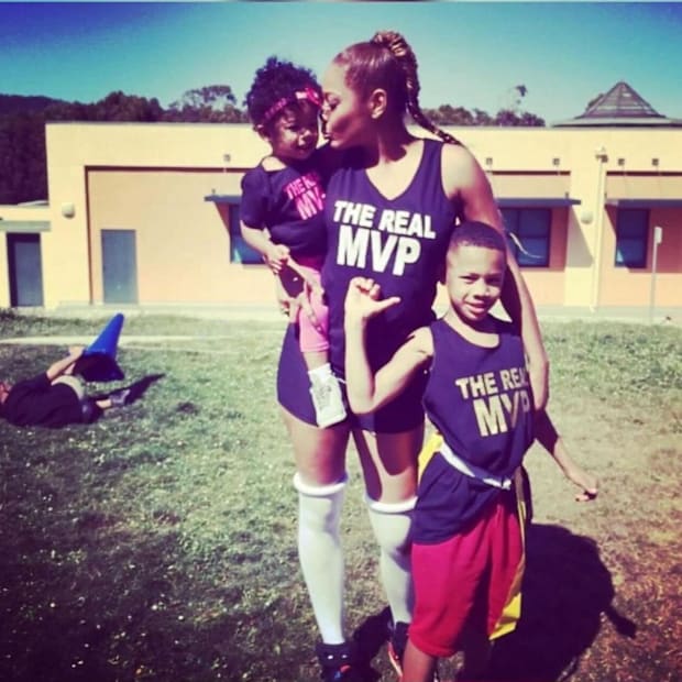 Phillip Bell III (right) with his mother and little sister when Bell III was a young boy.