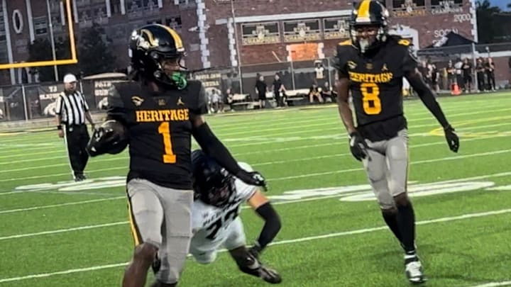 American Heritage receiver Malachi Toney (1) gets to the sidelines after a long completion in a win against Western. Toney had two touchdowns in that game. He led the Patriots to their sixth state title on Dec. 13.