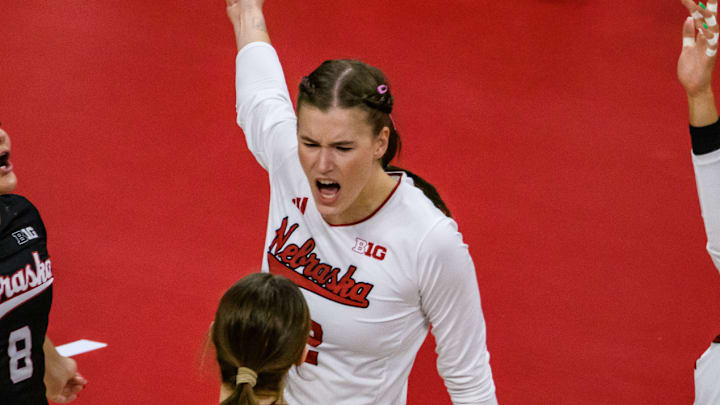The Huskers celebrate Lindsay Krause's kill. The Huskers celebrate Lindsay Krause's kill.