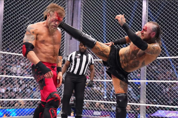 Adam Copeland and Malakai Black at Double or Nothing in a barbed wire steel cage match