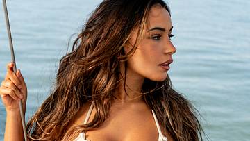 Gabi Moura was photographed by Katherine Goguen at Sundance Sailing Tour off of Fort Myers Beach, Fla. Swimsuit by Capittana.