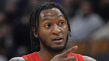 Toronto Raptors guard Immanuel Quickley gestures to a team mate during the second half against the Houston Rockets.