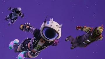 Fortnite characters blasting off and diving back to the ground.