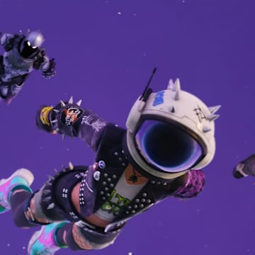 Fortnite characters blasting off and diving back to the ground.
