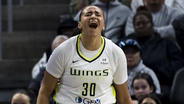 Jul 25, 2025; San Francisco, California, USA;  Dallas Wings guard Haley Jones (30) reacts during the third quarter against the Golden State Valkyries at Chase Center. Mandatory Credit: John Hefti-Imagn Images