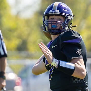 Western Beaver quarterback Jaivin Peel (7) looks to throw a pass towards the sideline during the second half of the Golden Beavers Midwestern Conference game against Ellwood City in Week 6 at Rich Niedbala Field.