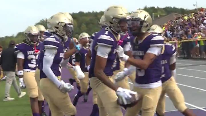 CBA Syracuse senior receiver Kieghlin Hicks (1) made a 10-yard, one-handed touchdown catch as time expired in the first half against CBA-Albany on Saturday. CBA Syracuse won, 42-9.