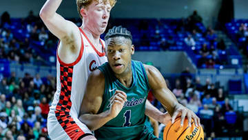 New Arkansas Razorback offer JJ Andrews from Little Rock Christian drives in the lane in the Class 4A state championship game in March at Hot Springs against the Farmington Cardinals.