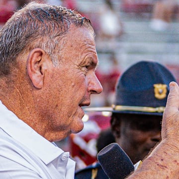 Arkansas Razorbacks coach Sam Pittman doing TV interview before halftime against the UAB Blazers at Razorback Stadium in Fayetteville, Ark.