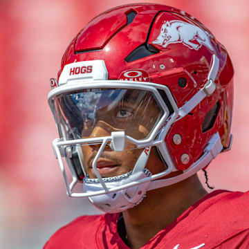 Arkansas Razorbacks quarterback Taylen Green looking up a scoreboard against the UAB Blazers at Razorback Stadium in Fayetteville, Ark.