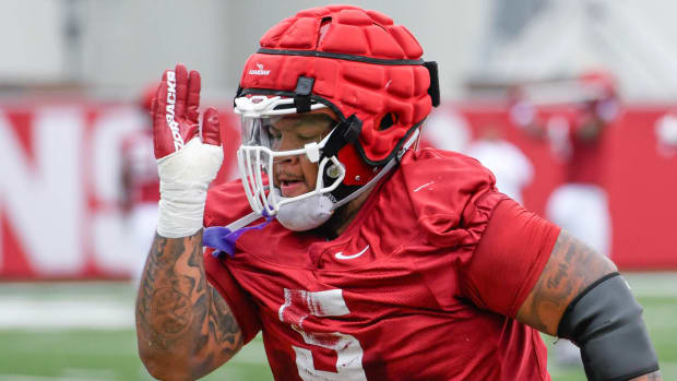 Razorbacks Cam Ball during summer practice drill.