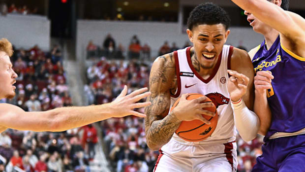 Razorbacks forward Jalen Graham finds difficulty driving inside against Lipscomb