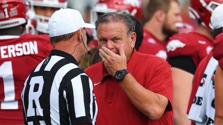 Arkansas Razorbacks coach Sam Pittman talks with official during win over UAPB at War Memorial Stadium in Little Rock, Ark., on Oct. 23, 2021.