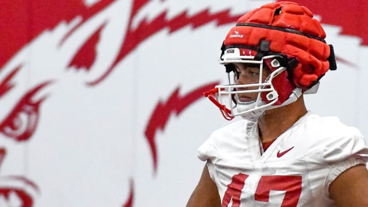 Arkansas Razorbacks' Maddox Lassiter during practice indoors Thursday at fall camp working with tight ends before moving to running backs group in Fayetteville, Ark.