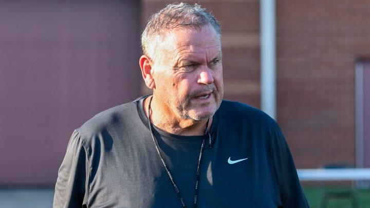 Arkansas Razorbacks coach Sam Pittman watching a drill during summer practice on the outdoor practice field in Fayetteville, Ark.