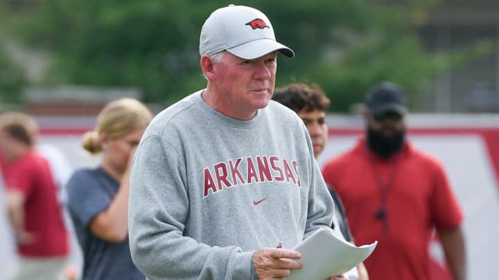 Arkansas Razorbacks offensive coordinator Bobby Petrino at a fall camp practice on the outdoor field in Fayetteville, Ark.