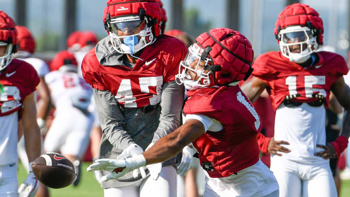 Arkansas Razorbacks' defensive back Jaylon Braxton breaks up a pass during drills on the outdoor field at fall camp in Fayetteville, Ark.