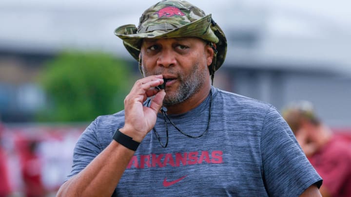 Arkansas Razorbacks defensive line coach Deke Adams during fall camp drills on the outdoor fields in Fayetteville Ark., on Aug. 7, 2024.