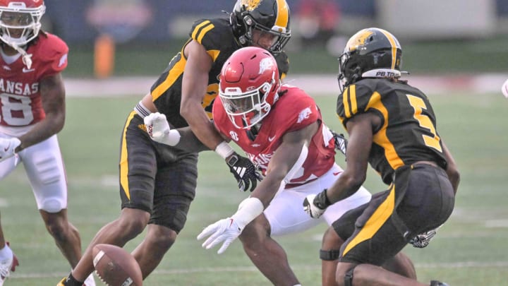 Arkansas Razorbacks linebacker Brad Spence chases a loose ball against UAPB.