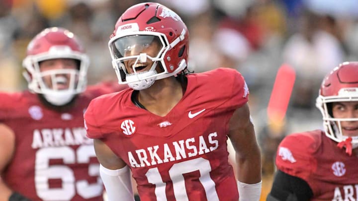 Arkansas Razorbacks quarterback Taylen Green celebrates a touchdown against UAPB at War Memorial Stadium in Little Rock, Ark.,